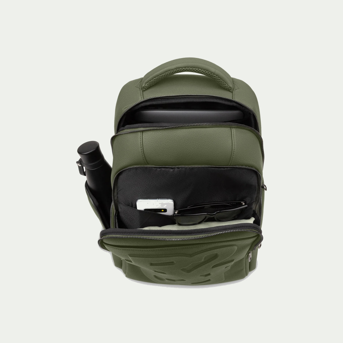 Rick Ross Boss Edition embossed backpack in Grit Green, open main compartment and organizer pockets