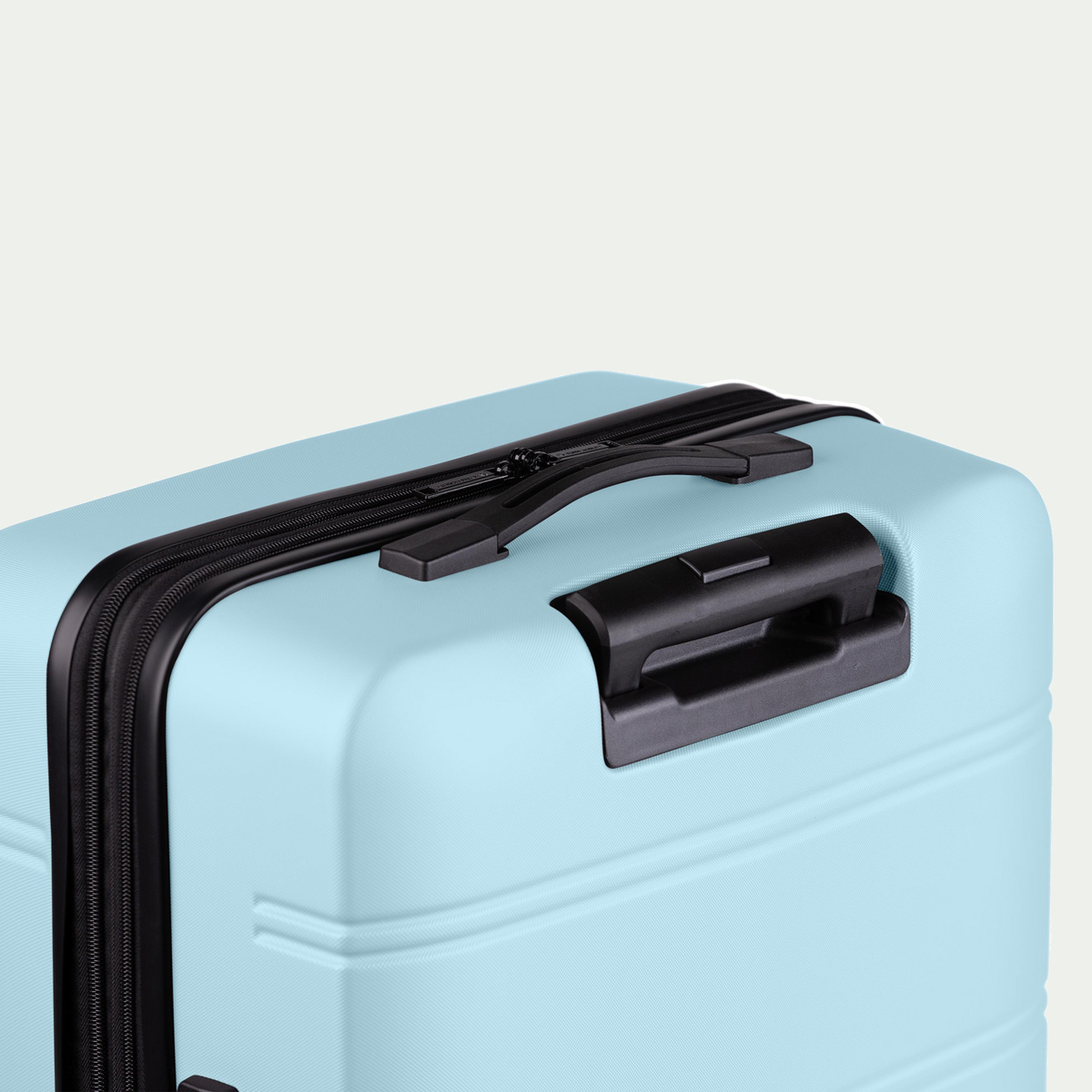 Swiss Mobility LAX three-piece luggage set in light blue, rear handle detail