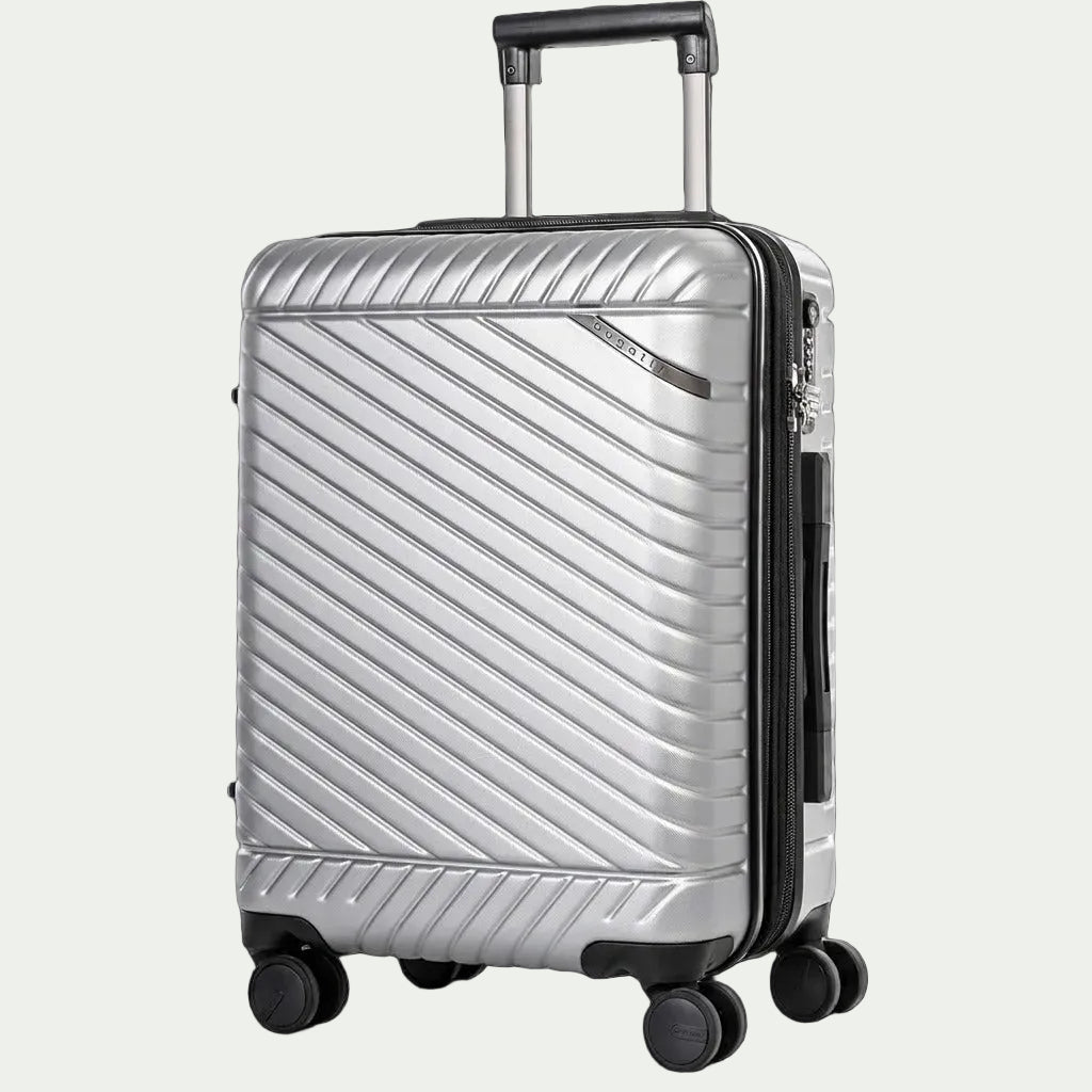 Silver Bugatti Oslo carry-on luggage with textured polycarbonate shell, telescoping handle, and spinner wheels.