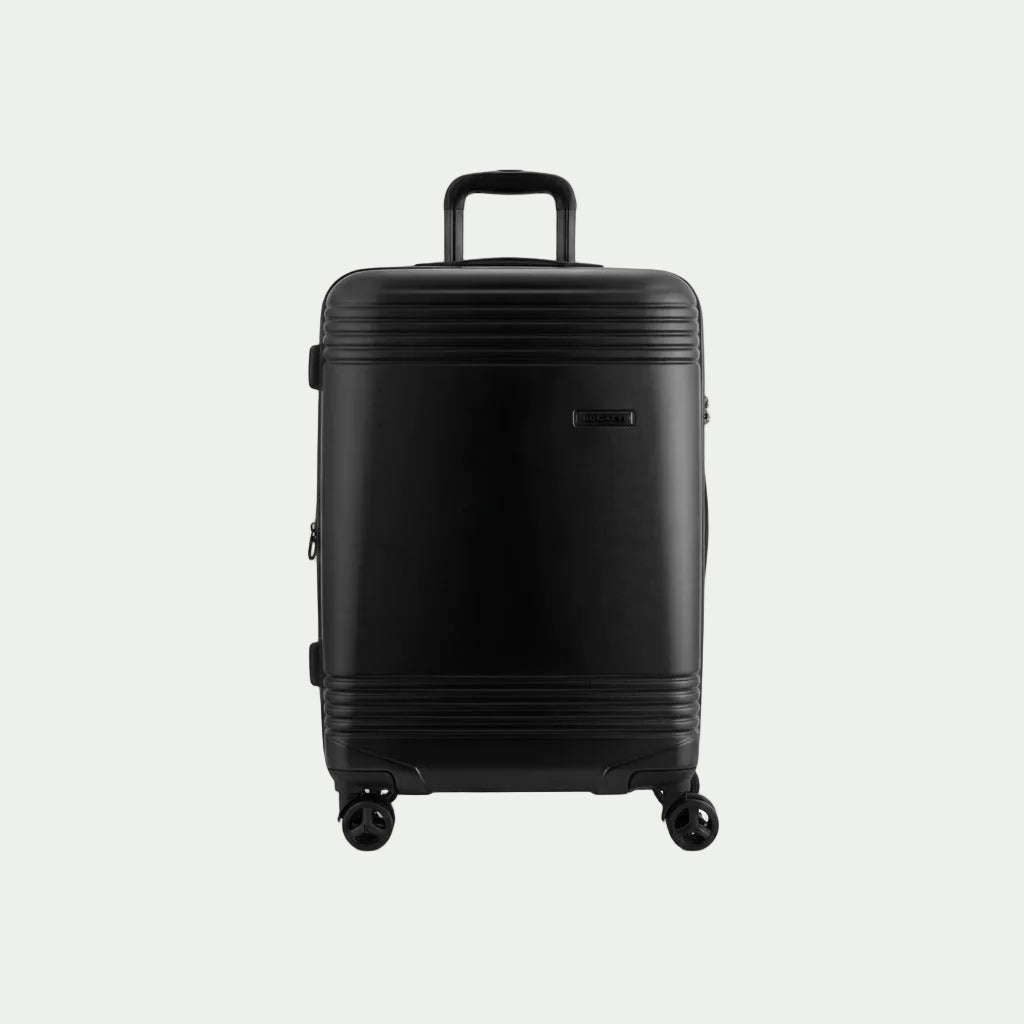 Bugatti Nashville 24-inch black checked luggage with hardshell exterior and spinner wheels.