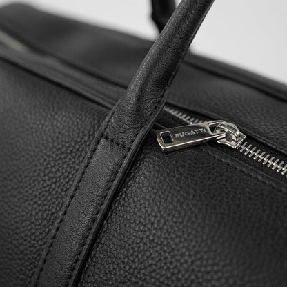 Macro view of the Bugatti Opera Duffle Bag showing textured vegan leather and a silver zipper pull.