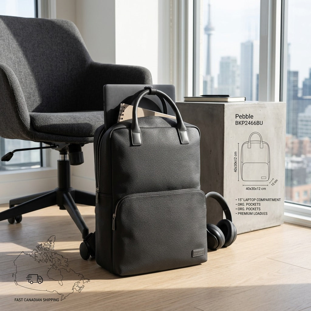 Black Bugatti Contrast Pebble grain vegan leather backpack in a modern office with city views of Toronto.