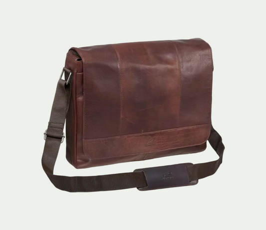 Brown Mancini Buffalo Collection leather messenger bag with adjustable shoulder strap and logo.