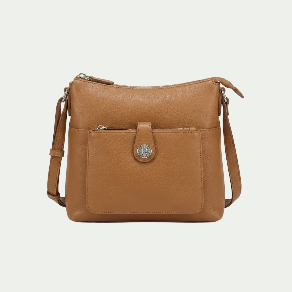Mancini camel pebbled leather crossbody bag with RFID protection, front zip pocket, and logo emblem.