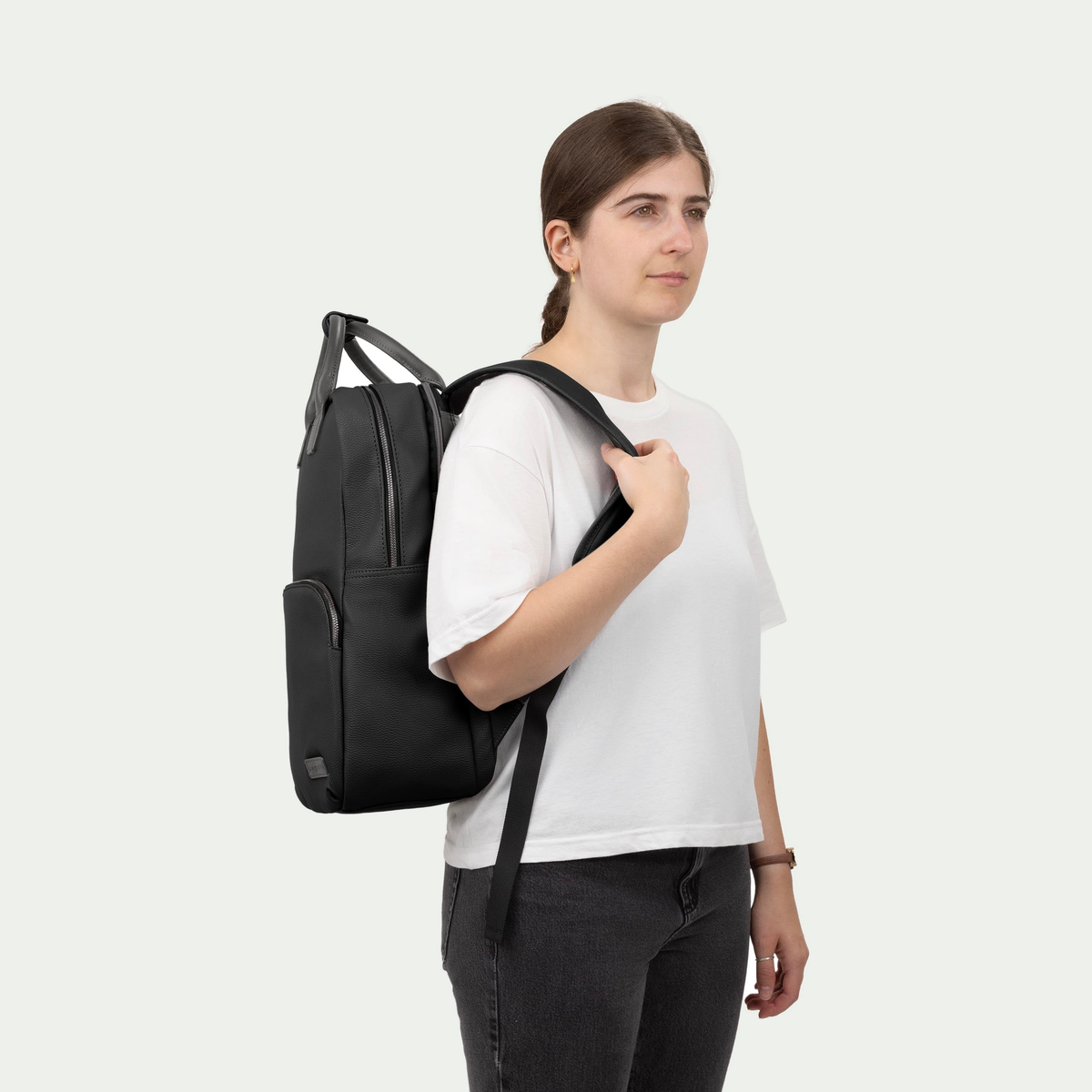 Bugatti Contrast backpack in black, worn on a model’s back