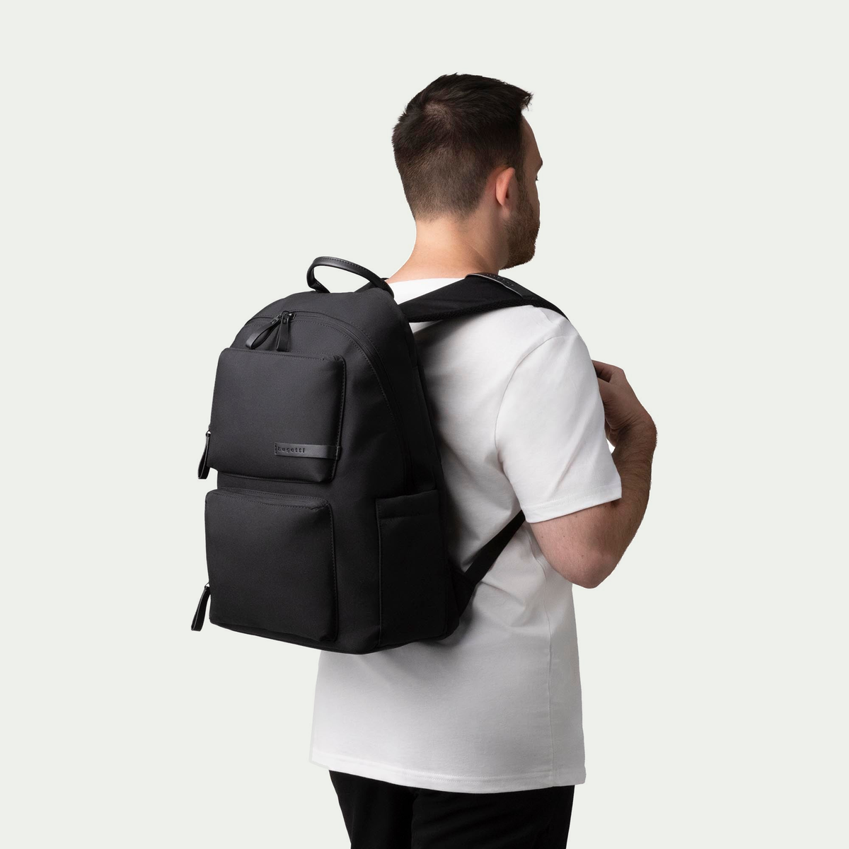 Bugatti Madison backpack in black, worn on a model’s back