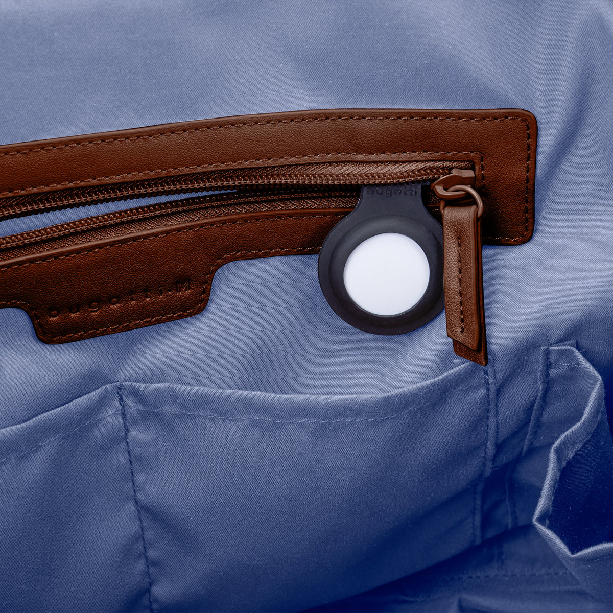 Bugatti Raphael convertible tote in brown, interior tracker pocket close-up