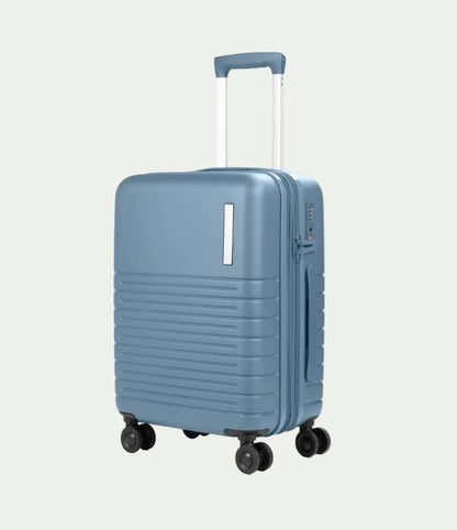 A light blue hard-shell spinner suitcase with an extended telescopic handle, shown on a plain white background.