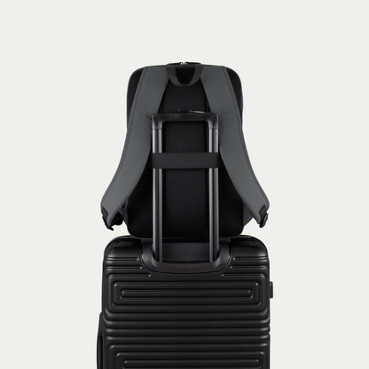 Swiss Mobility Urban Pro Backpack Grey, rear trolley sleeve shown over a suitcase handle