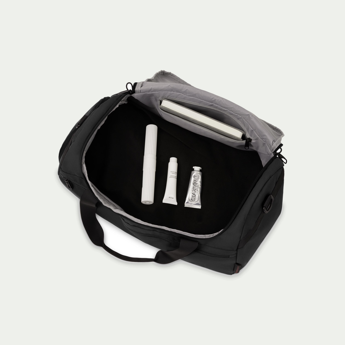 Swiss Mobility Urban Pro Duffle Bag Black, open main compartment with toiletries