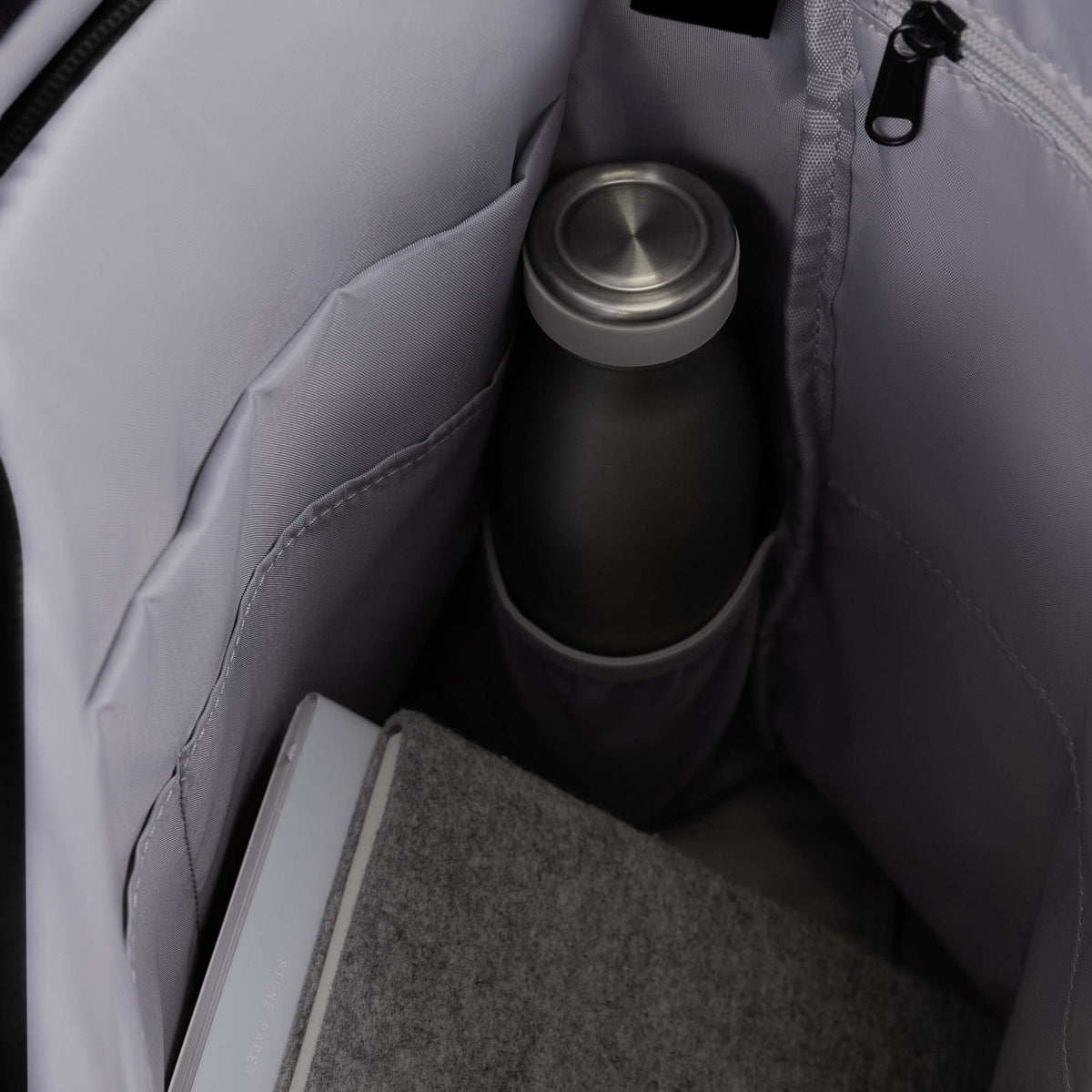 Swiss Mobility Urban Pro Backpack Black, interior bottle pocket close-up