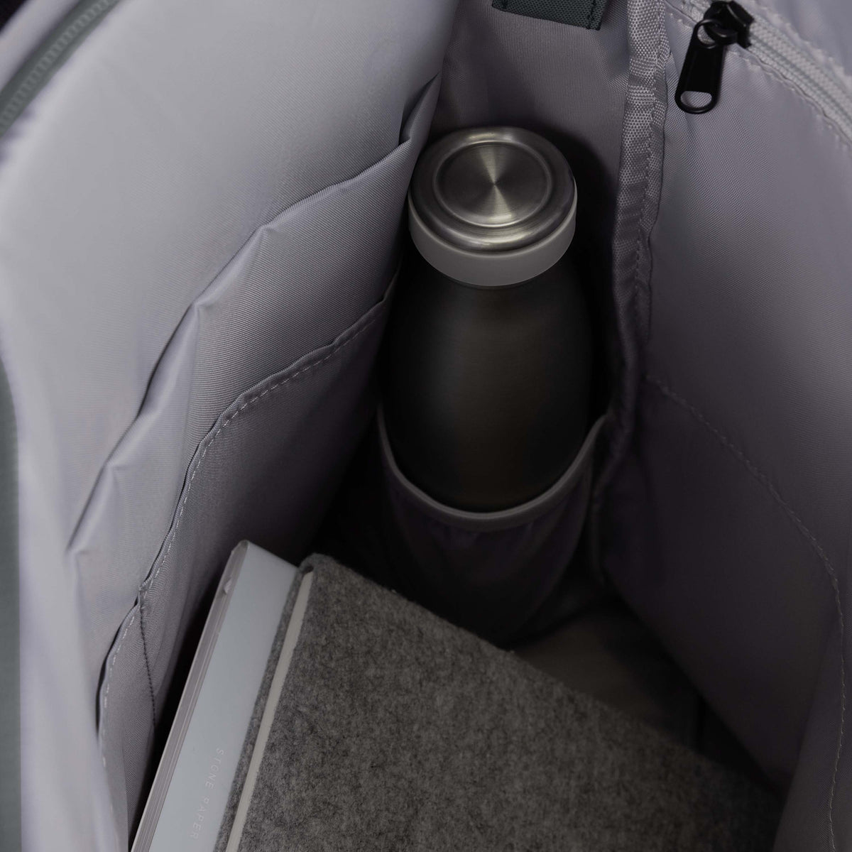 Swiss Mobility Urban Pro Backpack Grey, interior bottle pocket close-up