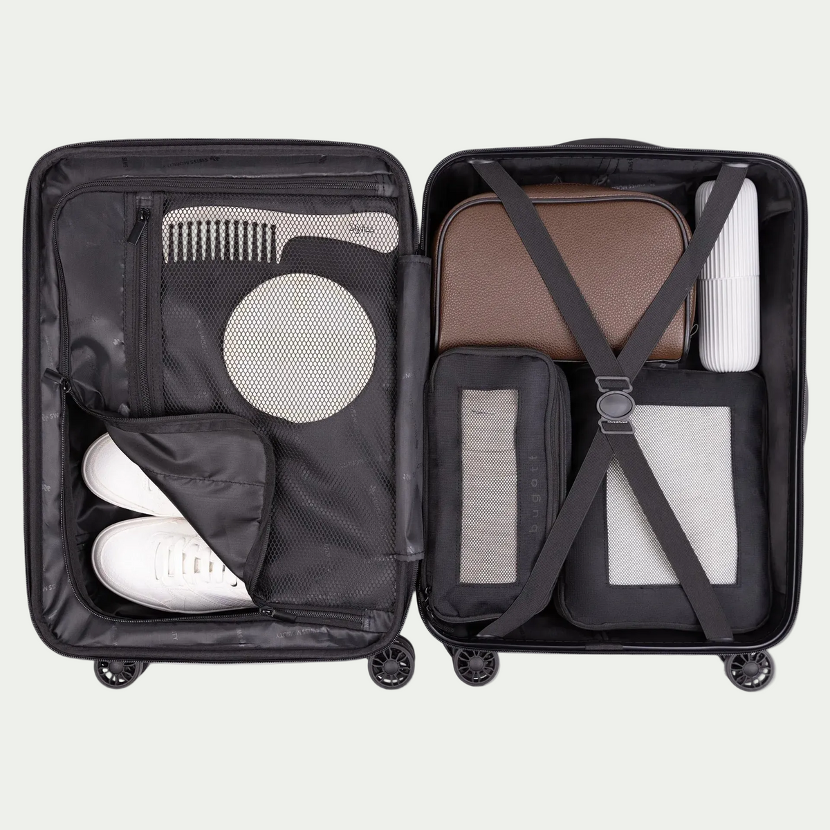 Swiss Mobility LAX 20-inch suitcase in yellow, interior shown with packing props