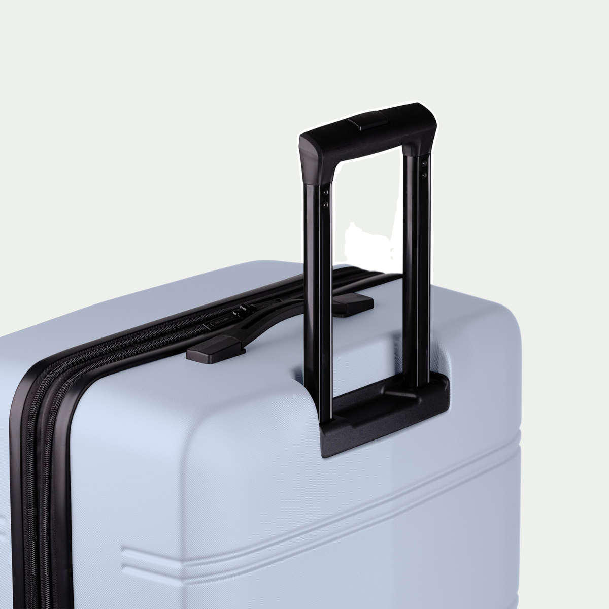 Swiss Mobility LAX 24-inch suitcase in light blue, close-up of the handle